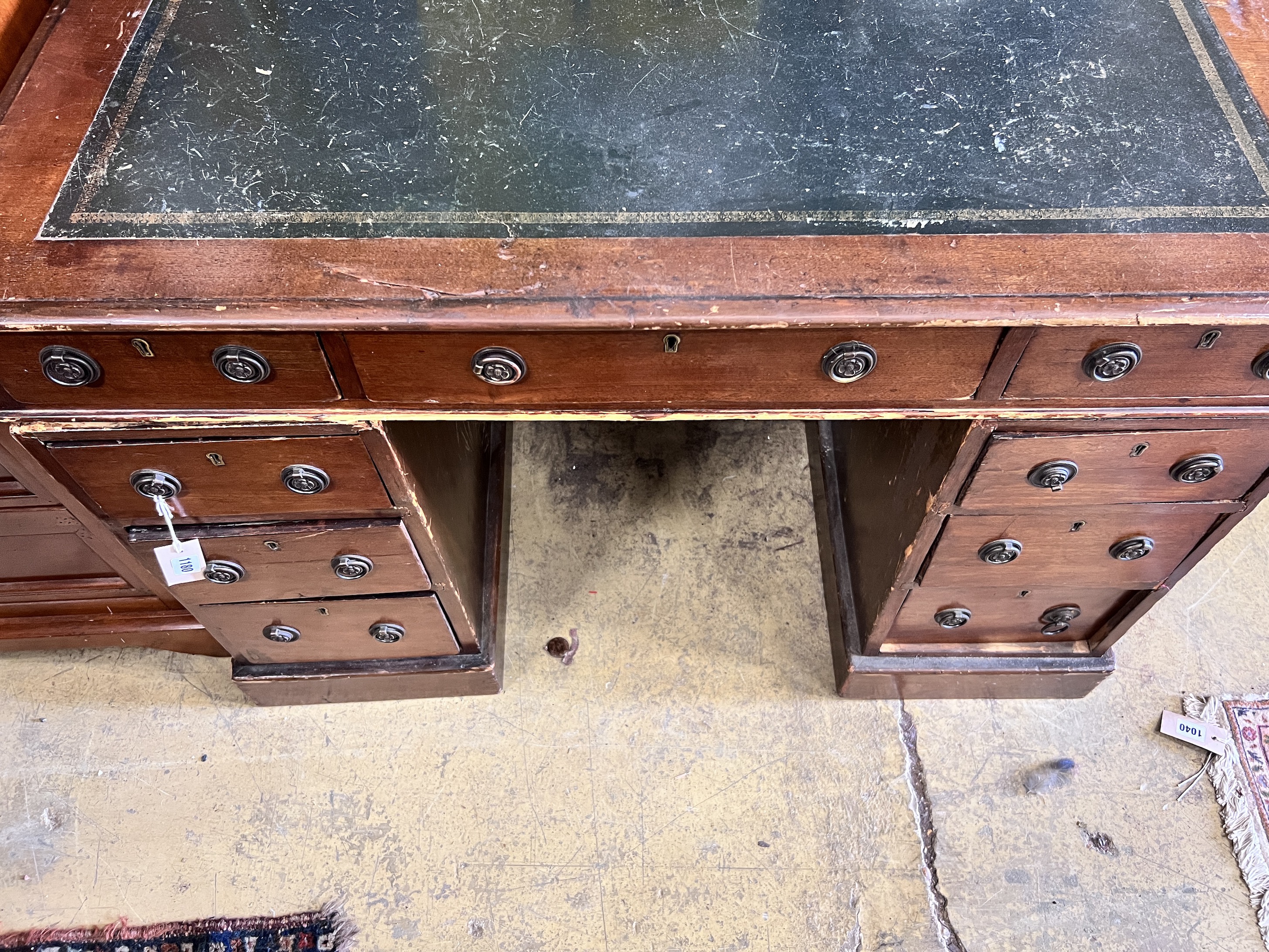 An Edwardian mahogany pine pedestal desk, width 104cm